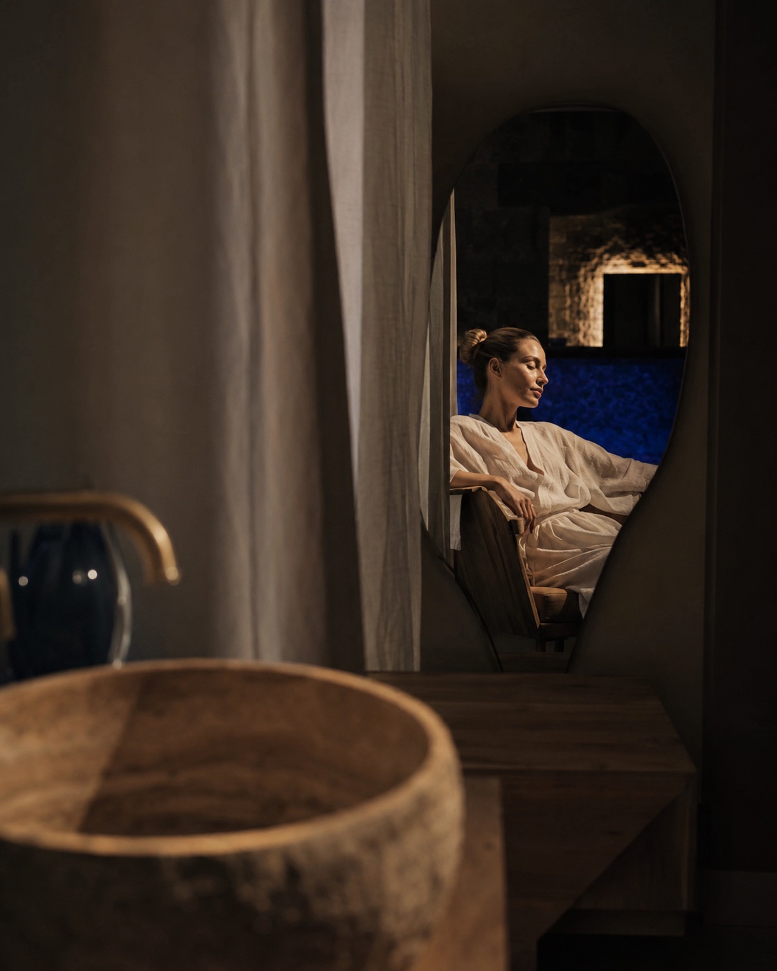 A woman relaxing in a quiet wellness retreat